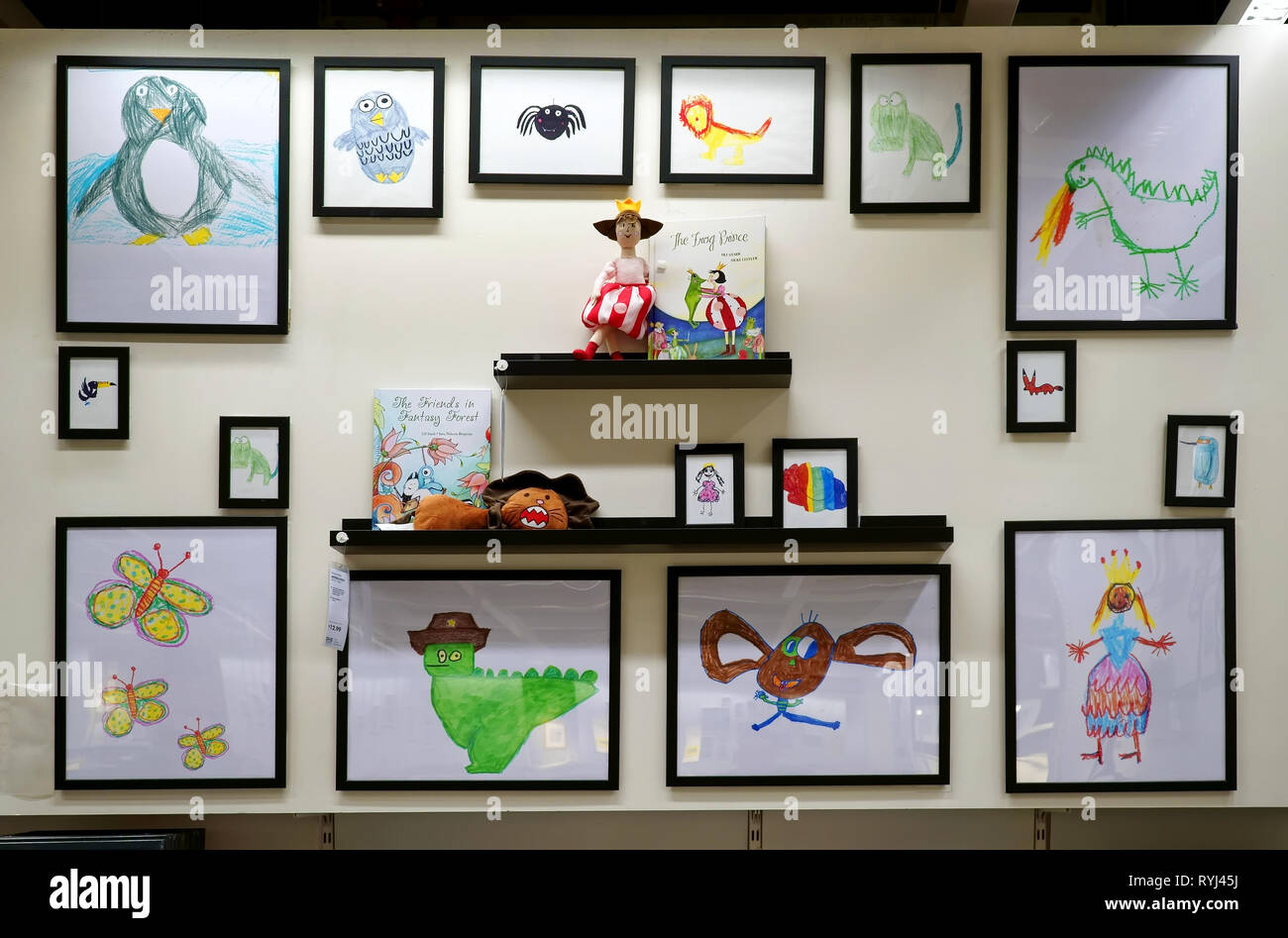 New Haven, CT USA. Sept 2018. A picture wall display of children`s graphic art at a popular home furnishings store. Stock Photo
